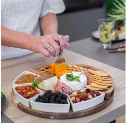 Cheese Cutting Board with cheese nuts and biscuits