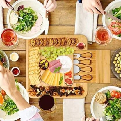 Premium Cheese Board and Platter Set central to a dinner party