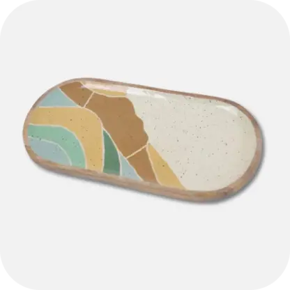 Oval Charcuterie Platterl with a wave pattern, the primary colours are earthy blues, browns and green