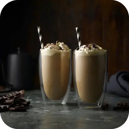 Iced coffee in double walled drinking glass