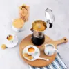 Bialetti Brikka Coffee Maker serving in espresso cups and biscuits