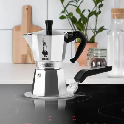 Bialetti induction adaptor plate on an induction hob brewing delightful coffee
