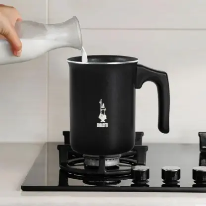 Pouring milk in a Bialetti Tuttocrema Manual Milk Frother