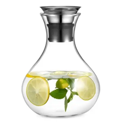 Clear Glass Pitcher With Handle filled with water and slices of lemon