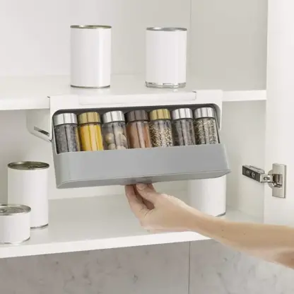 Under Shelf Spice Rack mounted under shelf with various spices in rack