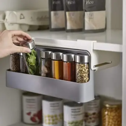Under Shelf Spice Rack unfolded with spice bottle being removed