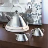 Alessi Michael Graves Electric Kettle in white on table top with creamer and sugar bowl