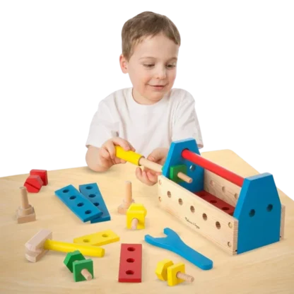 A child palaying with a Melissa & Doug take-along tool kit wooden construction toy