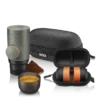 Minipresso GR2 Coffee Maker with a brewed esppresso, carrying case and cofee baskets and carrying case