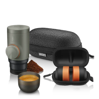 Minipresso GR2 Coffee Maker with a brewed esppresso, carrying case and cofee baskets and carrying case