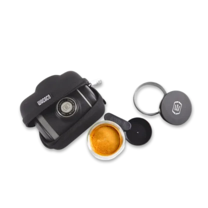 Picopresso Portable Espresso Machine viewed from top showing its component parts with a drawn espresso