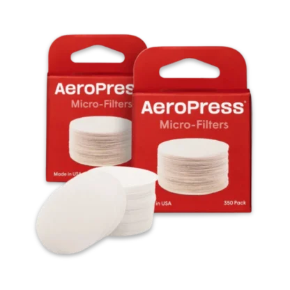 2 boxes of AeroPress paper micro-filters with a stack of filters in the foreground