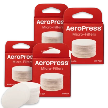 4 boxes of AeroPress paper micro-filters with a stack of filters in the foreground