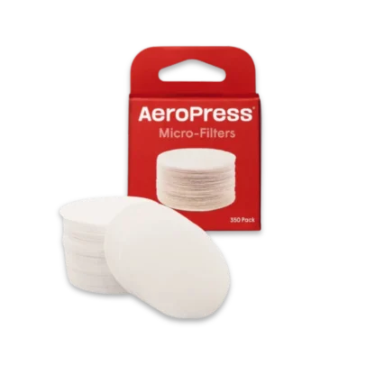 AeroPress paper micro-filters packaging with stack of filters in foreground
