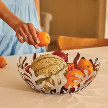 Polished Stanless Steel Alessi Mediterraneo Fruit Bowl filled with fruit