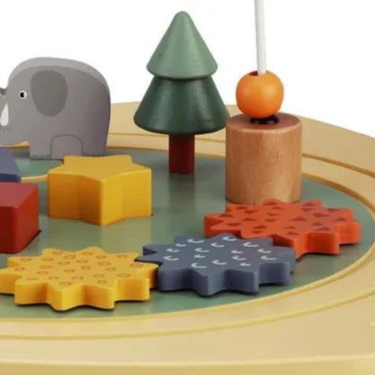 Wooden Activity Table Detail of blocks, shapes and cutouts