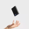 Black Mirror Mini Coffee Scale – Ultra-Thin Precision for Espresso & Pour-Over tossed in the air as a show of its light weight