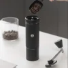 Chestnut S3 Portable Manual Coffee Grinder filling the hooper with beans