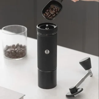 Chestnut S3 Portable Manual Coffee Grinder filling the hooper with beans