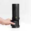 Showing the convenient grounds cup of the Millab 01 Portable Electric Coffee Grinder