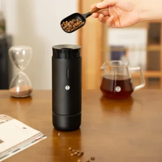 Whirly 01S Portable Electric Coffee Grinder filling it with coffee beans