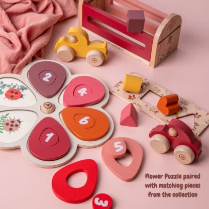 Partially Disassembled Chunky Flower Puzzle together with other toys of the collection