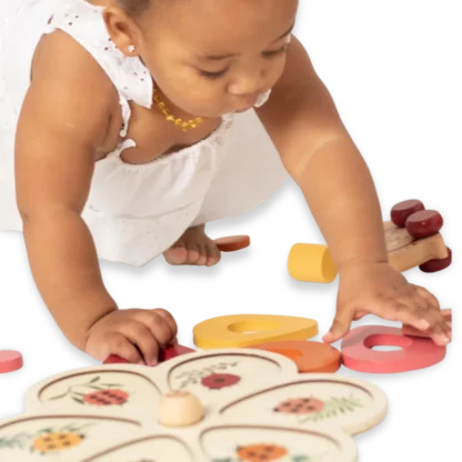 Child playing with the Chunky Flower Puzzle