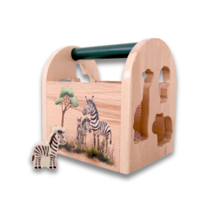 On Safari Shape Sorter Toy with Zebra piece in foreground with Zebra scene of Shape sorter toy in background