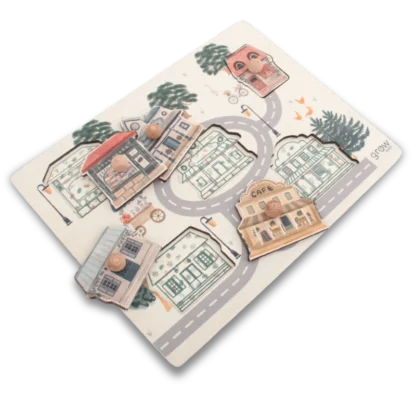 Little Greyton Peg Puzzle with pieces lying on tp of the back board