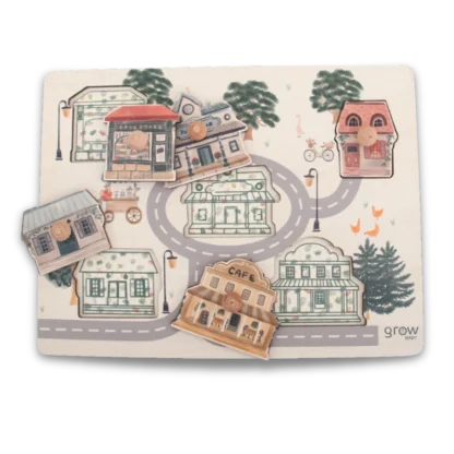 Little Greyton Peg Puzzle with pieces on top of the back board