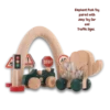 Wooden Elephant Push Toy on display with traffic signs and jeep push car