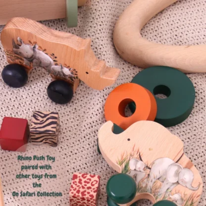Wooden Rhino Push Toy with more toys from the On Safari Collection
